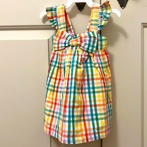 Plaid Baby girl dress. New with tags. Size 3-6 months. Ruffle butts